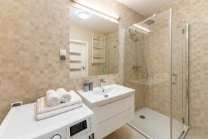 Kúpeľňa v ubytovaní Nadmorskie Tarasy Apartament 215 A Eltom Tour