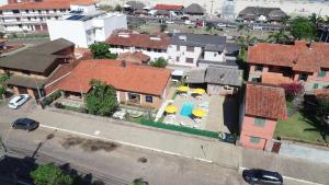 an overhead view of a house with roofs at Mare Blu - Pousada Hostel in Torres