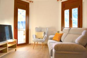 Posezení v ubytování Apartament comfortable amb vistes i cèntric by RURAL D'ÀNEU