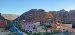 a small town in the middle of a mountain at Hôtel Titrit in Tafraout