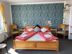 Ένα ή περισσότερα κρεβάτια σε δωμάτιο στο Penzion Slunečnice