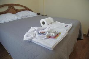 מיטה או מיטות בחדר ב-Hostal Premier Arequipa