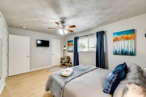 a bedroom with a bed and a ceiling fan at The Classic • Near Knox Henderson in Dallas