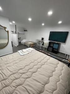 A bed or beds in a room at Holiday apartament