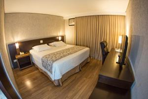 Postel nebo postele na pokoji v ubytování Hotel Campo Largo Comfort