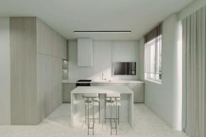 a kitchen with a counter and stools in it at 8 Blocks Apartments - Alexandroupoli in Alexandroupoli