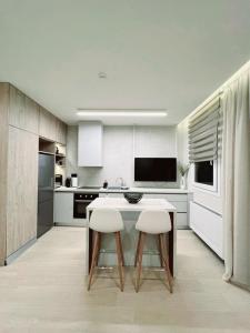 8 Blocks Apartments 4B tesisinde mutfak veya mini mutfak