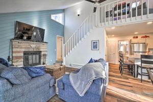 A seating area at Cozy Tobyhanna Cottage with Private Hot Tub!