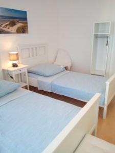 Кровать или кровати в номере L'EUROPEEN - Conseil de l 'Europe - Near Center - Homeoffice