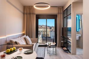 A seating area at Coeo Peña Design Apartments