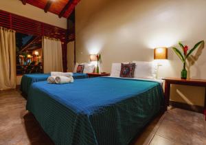 Cama o camas de una habitación en Casa de Palos Boutique