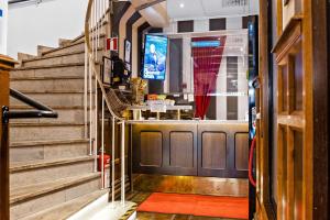 a set of stairs leading up to a restaurant at Best Western Hotel Savoy in Karlstad