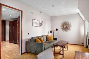 Posezení v ubytování Best Western Plus Grand Hotel