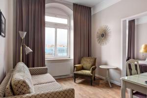 Posezení v ubytování Best Western Plus Grand Hotel