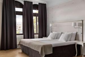 Postel nebo postele na pokoji v ubytování Best Western Plus Grand Hotel