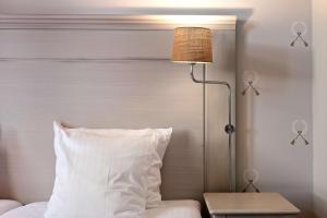 Postel nebo postele na pokoji v ubytování Best Western Plus Grand Hotel