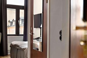 TV a/nebo společenská místnost v ubytování Best Western Plus Grand Hotel