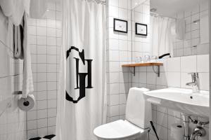 Koupelna v ubytování Best Western Plus Grand Hotel