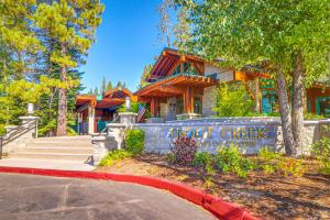 a house with a sign that reads iron creek at Golf Club Condos #437 in Truckee