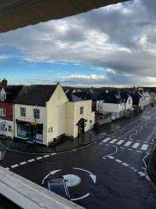 a view of a street with houses and a town at The Vale Hotel in Cricklade