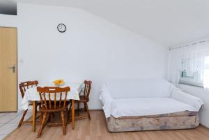 Postel nebo postele na pokoji v ubytování Apartments Anica J