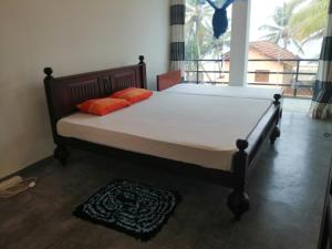 Ένα ή περισσότερα κρεβάτια σε δωμάτιο στο Sena Home