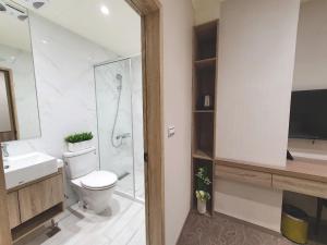 Baðherbergi á Grace Hotel Dunbei