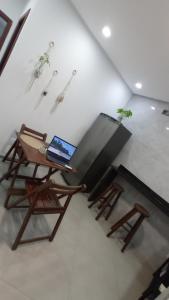 Televízia a/alebo spoločenská miestnosť v ubytovaní Apartamento Maresia