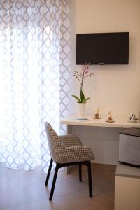 TV a/nebo společenská místnost v ubytování CasaPaola b&b Rooms