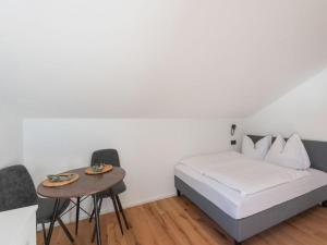 Ένα ή περισσότερα κρεβάτια σε δωμάτιο στο Leni's Mountain Appartements