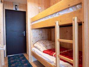 Ένα ή περισσότερα κρεβάτια σε δωμάτιο στο Val Thorens - Bel Appartement 4 pers, Balcon Sud, TV, Bluetooth, Cuisine Équipée, Local à Skis - FR-1-637-32