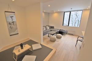 Posezení v ubytování Myoko Apartments