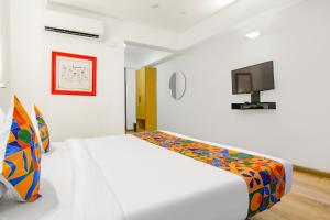 TV a/nebo společenská místnost v ubytování FabHotel Infinity Stays