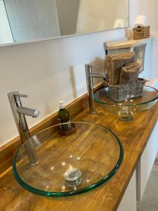 a sink with a faucet on a wooden counter at Auberge de la Croix du Pape in Èze