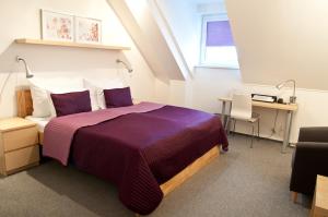 Postel nebo postele na pokoji v ubytování Hotel Berger + 27 fotografií