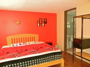 Postel nebo postele na pokoji v ubytování B&B México Roma Norte