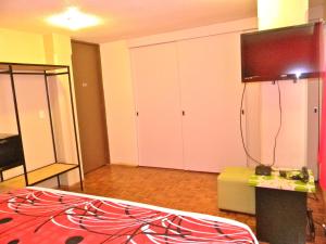 Postel nebo postele na pokoji v ubytování B&B México Roma Norte