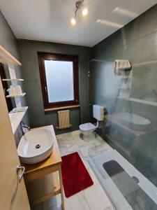Baðherbergi á Albergo Baffo