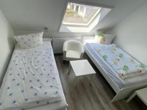 Postel nebo postele na pokoji v ubytování Hotel Braunlage