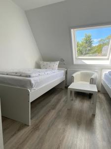 Postel nebo postele na pokoji v ubytování Hotel Braunlage