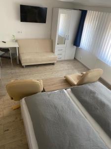 Postel nebo postele na pokoji v ubytování Hotel Braunlage