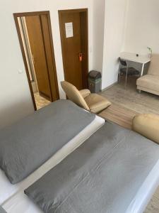 Ένα ή περισσότερα κρεβάτια σε δωμάτιο στο Hotel Braunlage
