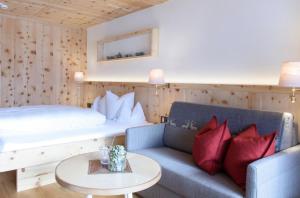 Postel nebo postele na pokoji v ubytování Hotel Montafoner Hof