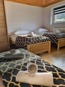 Postel nebo postele na pokoji v ubytování Apartament Za Potokiem