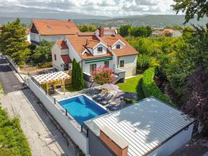 an aerial view of a house with a swimming pool at The Oasis in Trilj