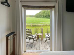Ein Balkon oder eine Terrasse in der Unterkunft B&B De Paenhoeve