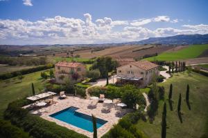 an aerial view of a house with a swimming pool at Borgo della Spiga - Adult Friendly Country House in Cervidone