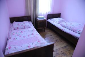 Een bed of bedden in een kamer bij Guest House LALI