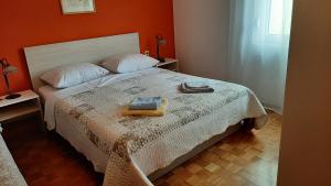 Postel nebo postele na pokoji v ubytování Rooms Neda