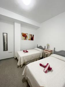 Posteľ alebo postele v izbe v ubytovaní Amplio apartamento en Av. Carlos Haya